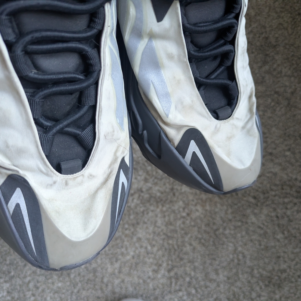 Yeezy Black and Cream Athletic Shoes